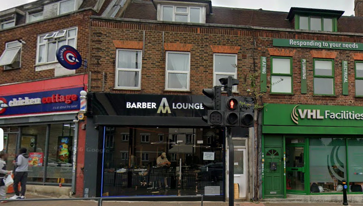 Street frontage of 329 High Road showing Barber Lounge